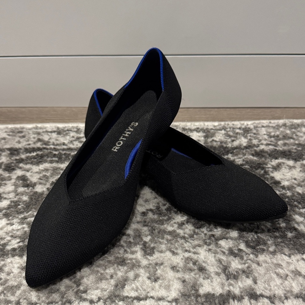 Rothy's Elegant Black Flats with Blue Trim